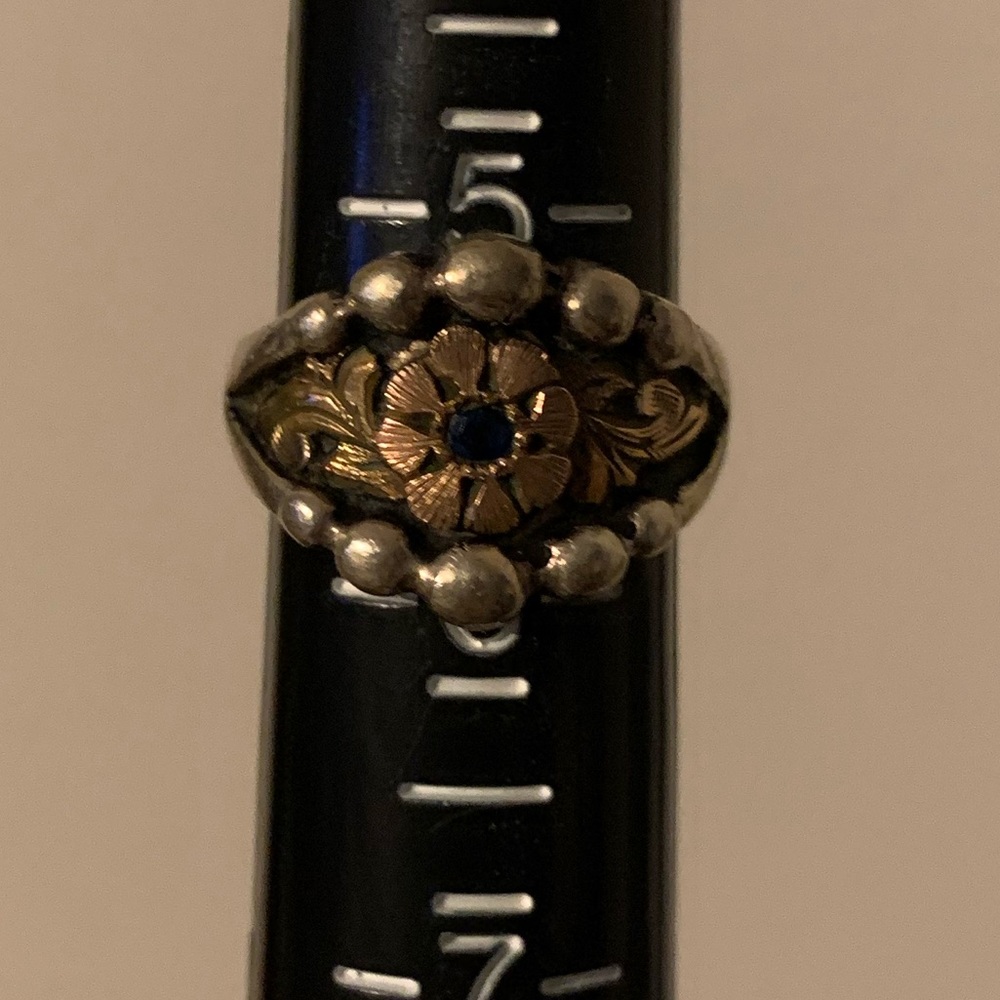 Hy O Silver floral ring with blue stone